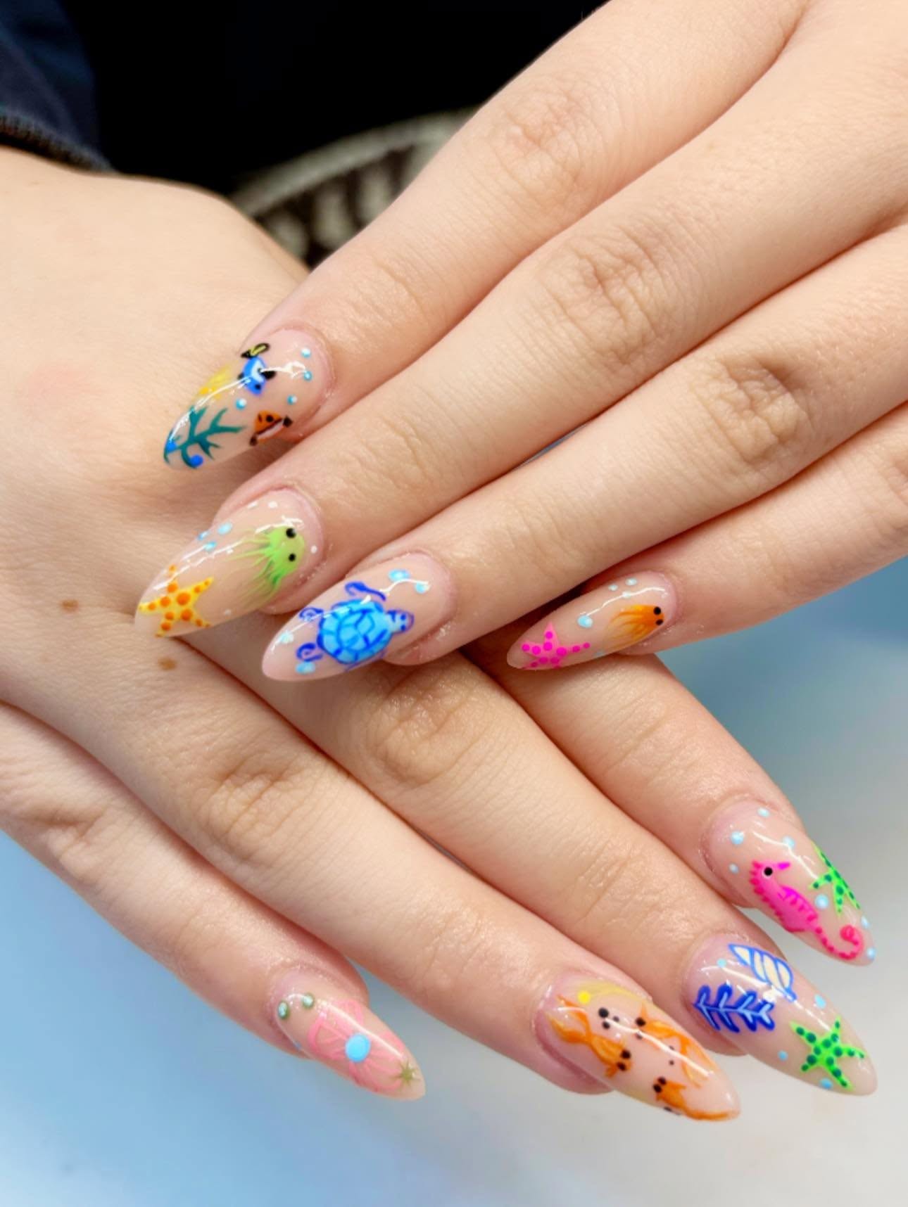 Hand-painted ocean animal nail art