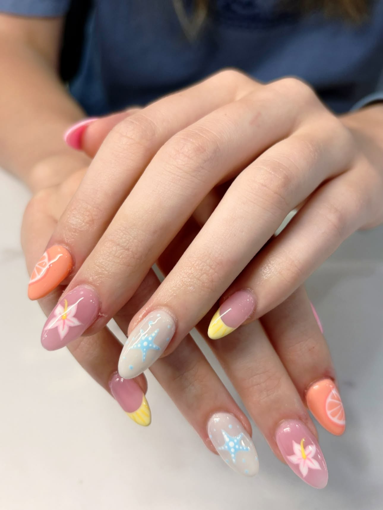 Pastel summer nails with starfish and citrus art